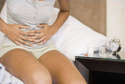 При месячных сильно болит позвоночник